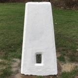 Repainted white trig point on Barn Hill