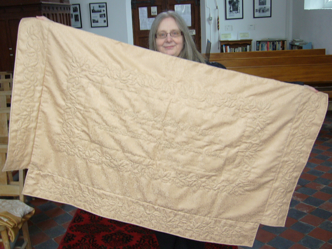 Eileen shows us the new altar cloth