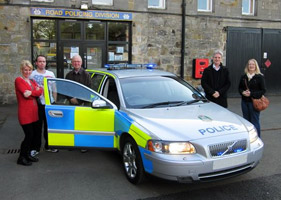 The group inspect a jam sandwich in battenburg livery